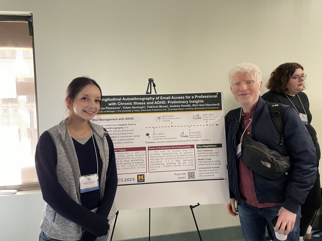 Veronica Pimenova and Yotam standing on either side of their ASSETS 2025 poster on a longitudinal autoethnography of email access.